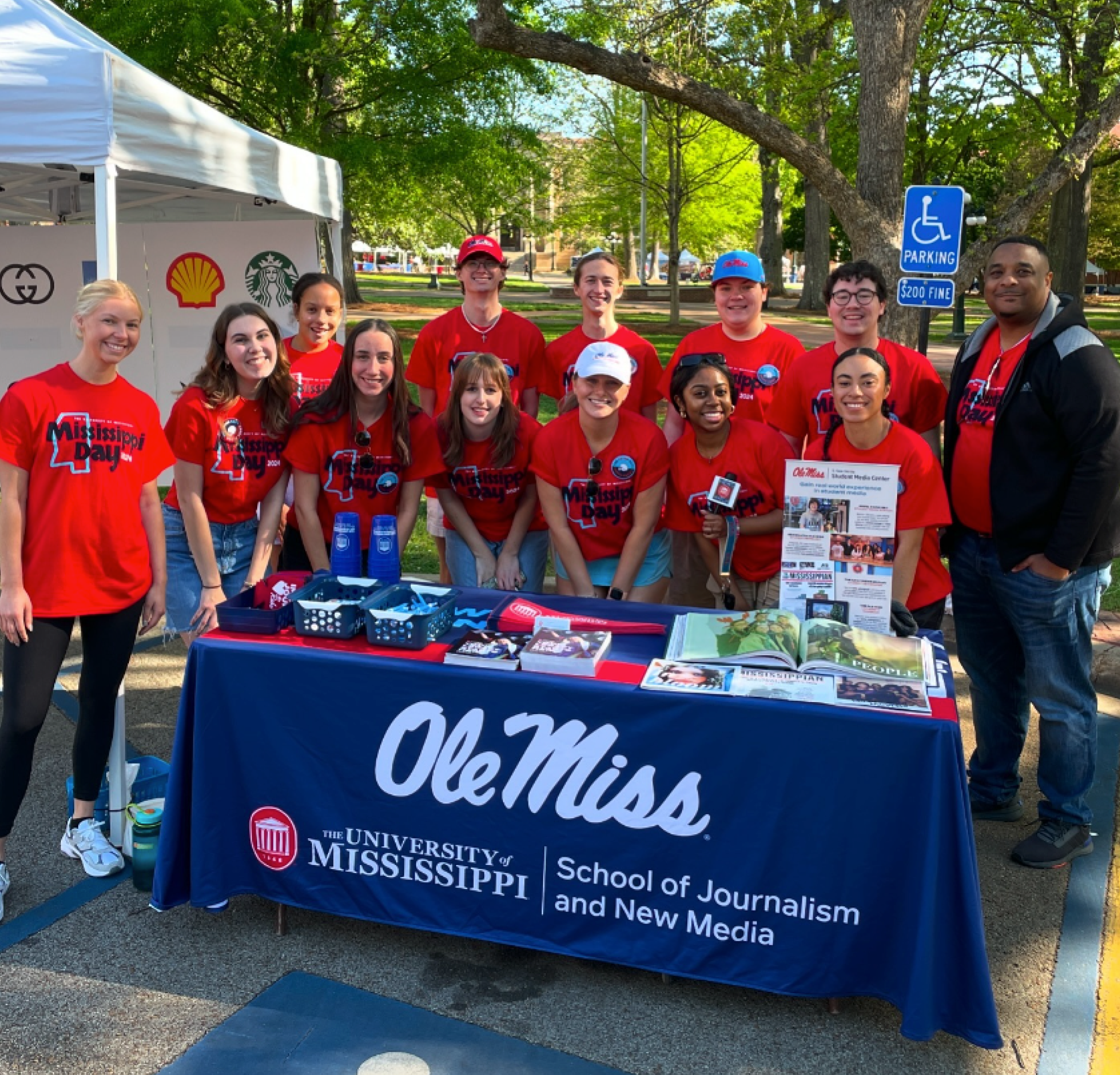 Group of student ambassadors pose for a photo.